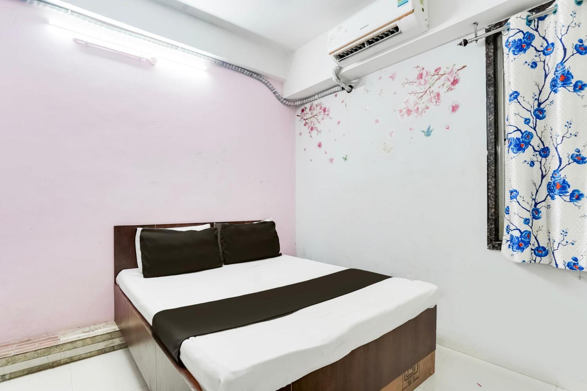 Hotel O Day Night Rooms Surat Exterior photo